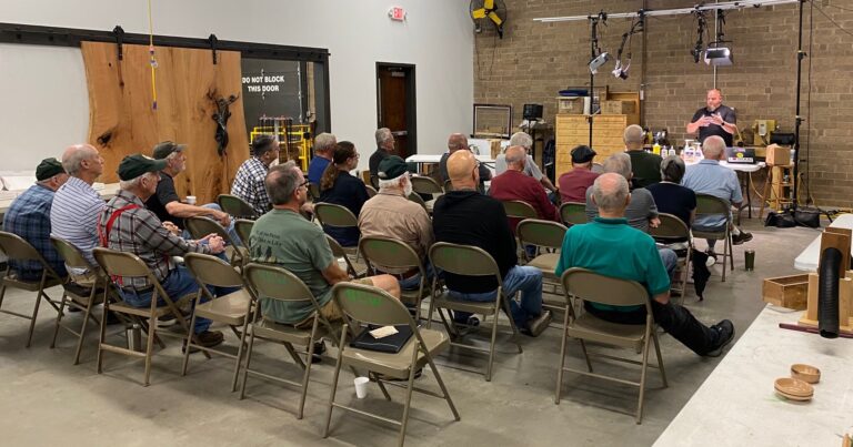 The club listening to a presentation on the many kinds of glue for woodworkers.