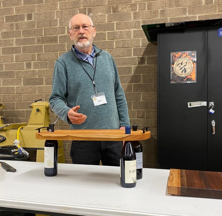 Bob's charcuterie board with wine bottles