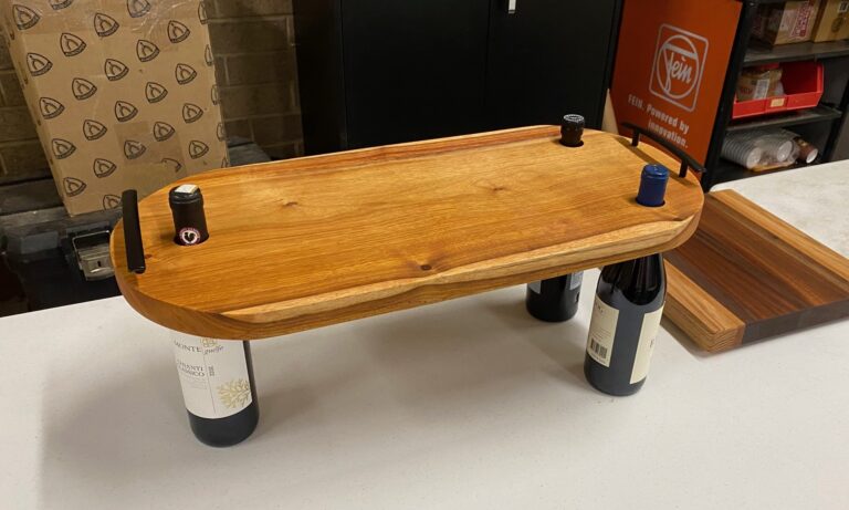 Bob's charcuterie board with wine bottles