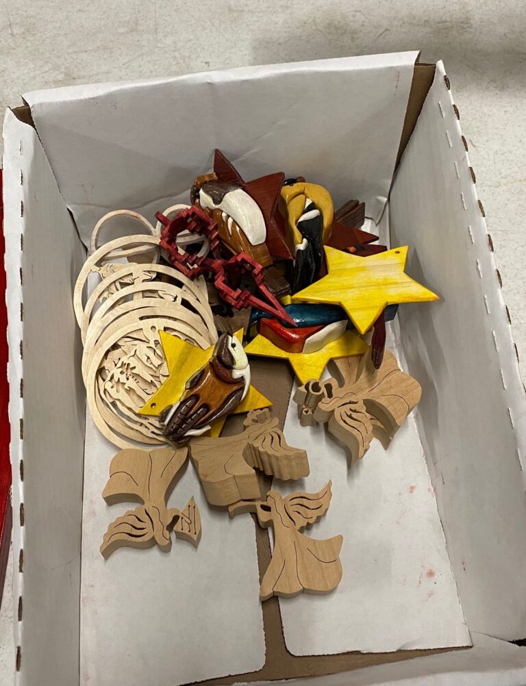 Juanita brought a box full of scroll saw work