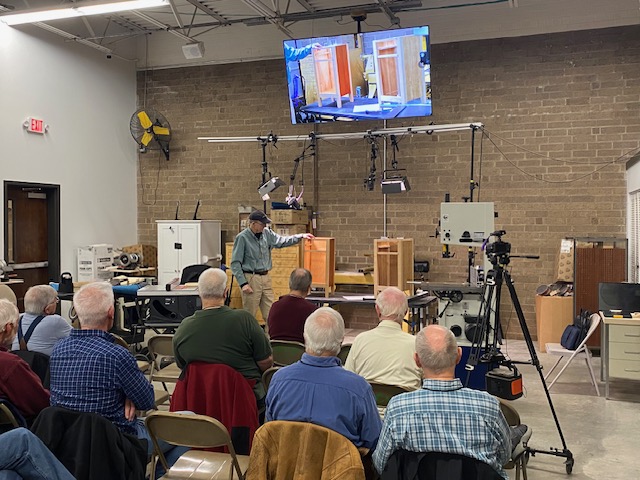 John Ferguson demonstrates how to cut and fit a bottom panel into furniture project.