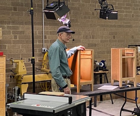 John Ferguson demonstrates how to cut and fit a bottom panel into furniture project.