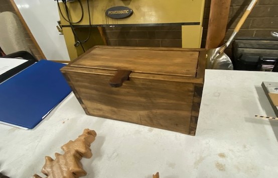 Lidded box with hinges